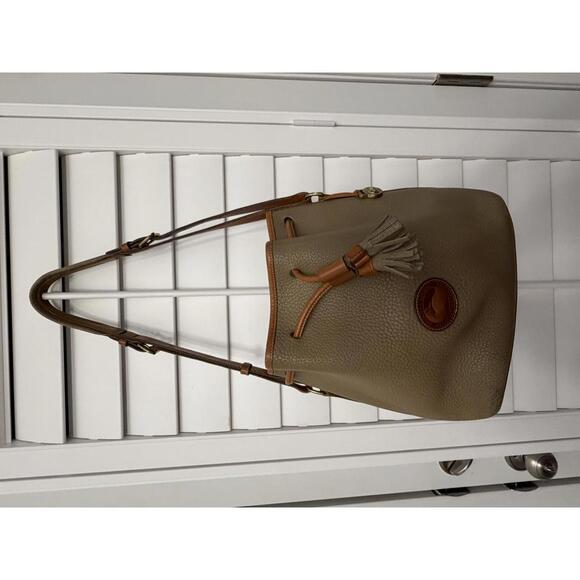 Dooney & Bourke Handbags - vintage Dooney & Bourke All-Weather Leather drawstring bucket bag in the taupe